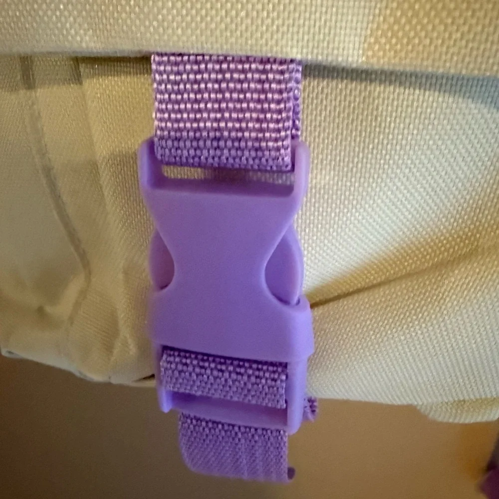 Cream Backpack with Purple Accents and Plush Keychain